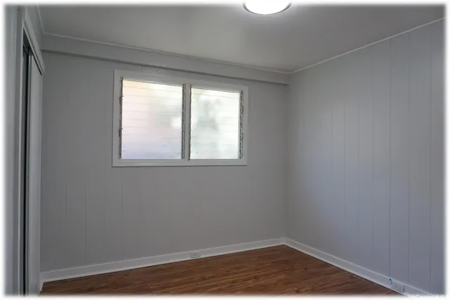 a view of a room that has a window