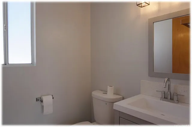 a bathroom with a sink and a toilet