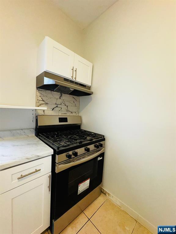 489 South 17th Street, Unit 1 Newark, NJ 07103 - Photo 2 of 9 a stove top oven sitting inside of a kitchen
