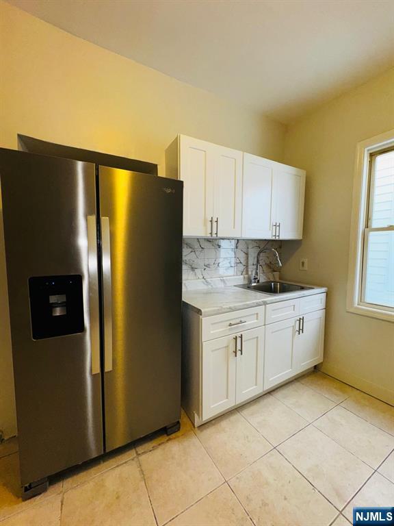 489 South 17th Street, Unit 1 Newark, NJ 07103 - Photo 9 of 9 a kitchen with stainless steel appliances granite countertop a refrigerator and a stove