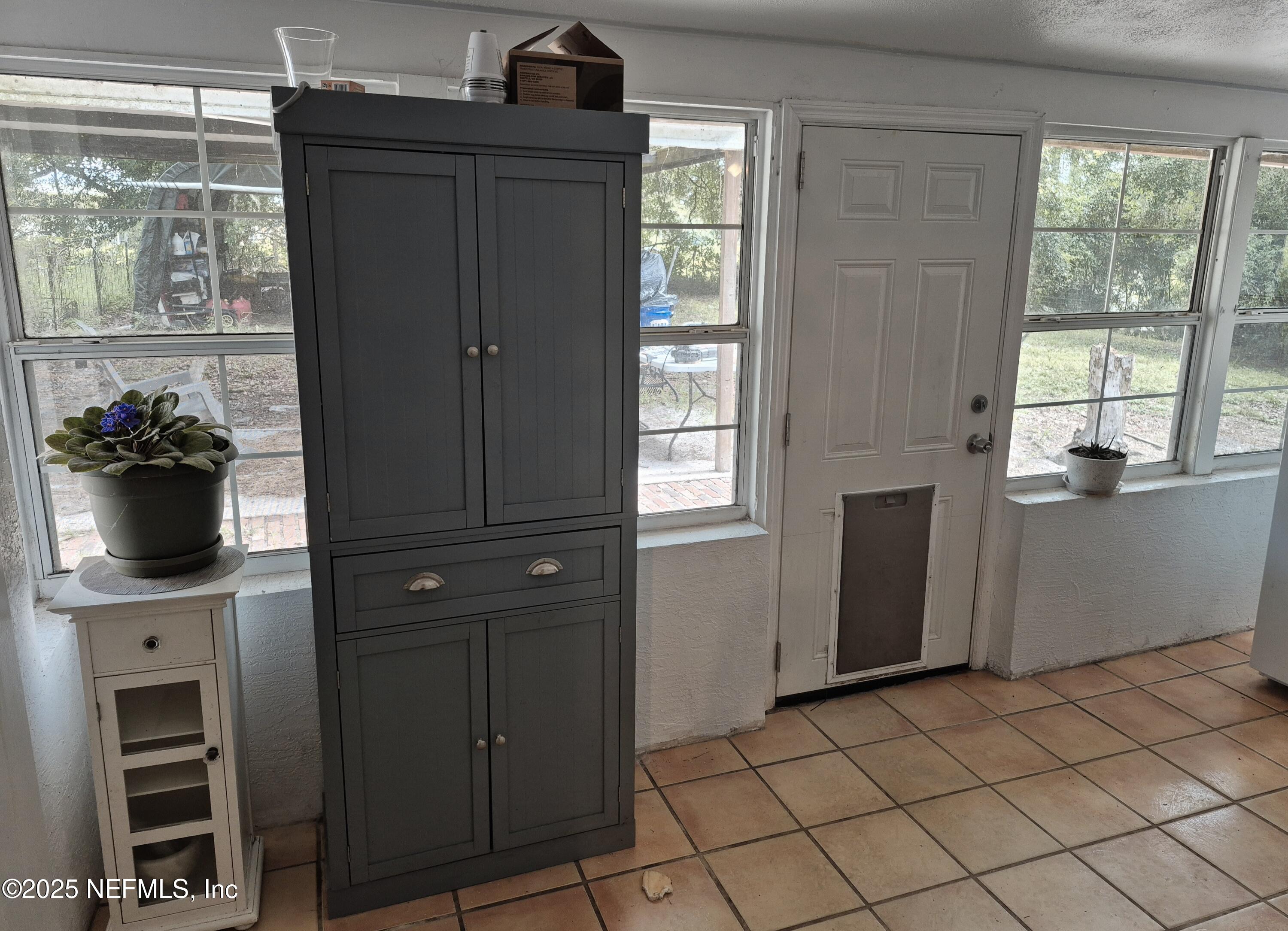 282 Byrd Road Crescent City, FL 32112 - Photo 17 of 24 a view of a kitchen with a window