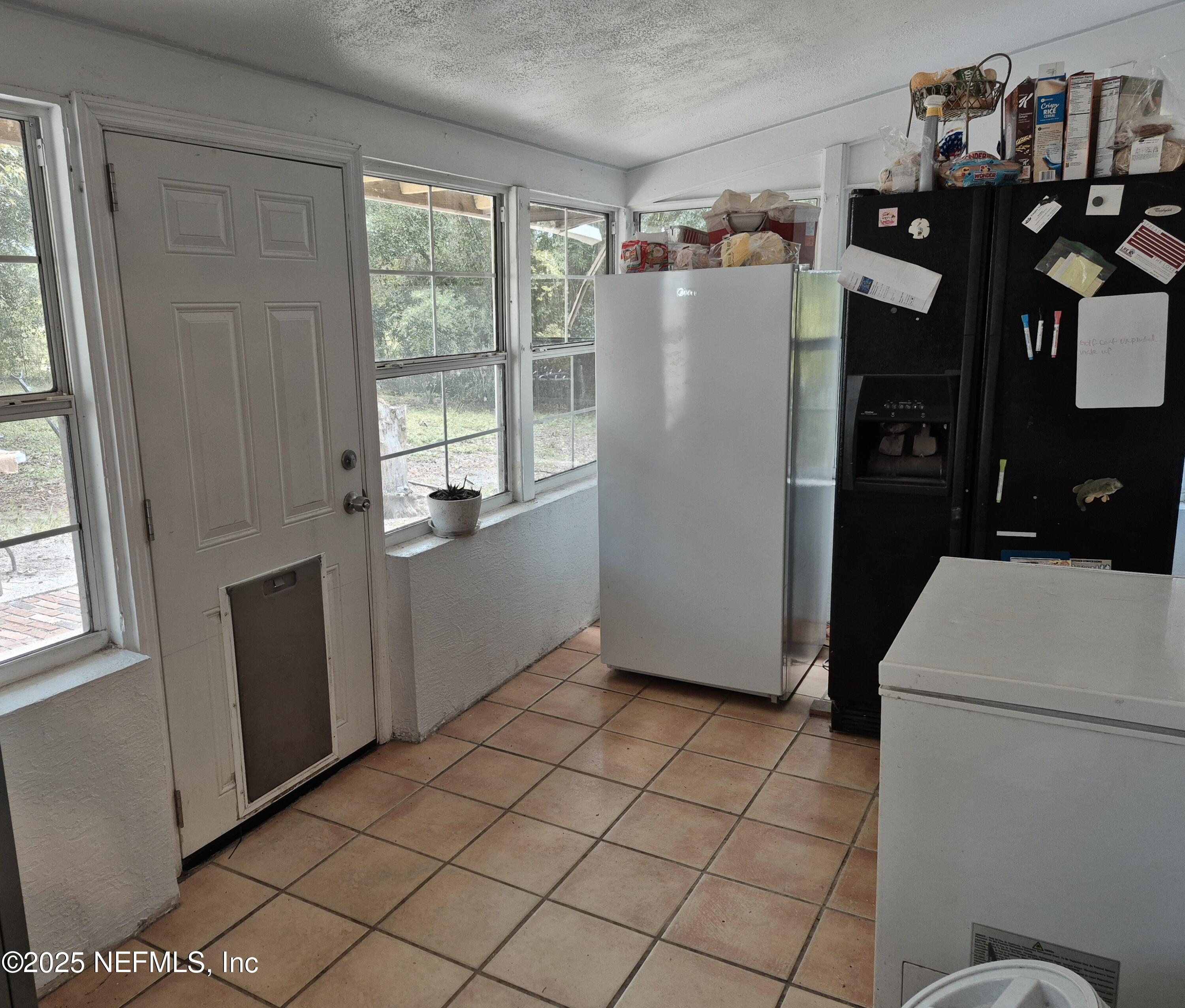 282 Byrd Road Crescent City, FL 32112 - Photo 18 of 24 a utility room with dryer and washer