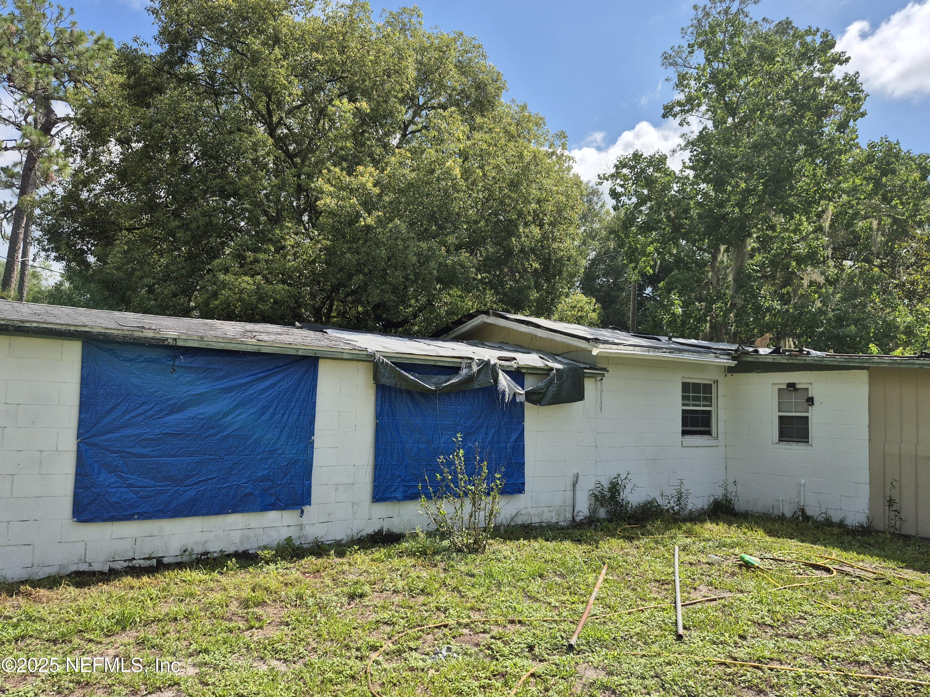 282 Byrd Road Crescent City, FL 32112 - Photo 23 of 24 a backyard of a house