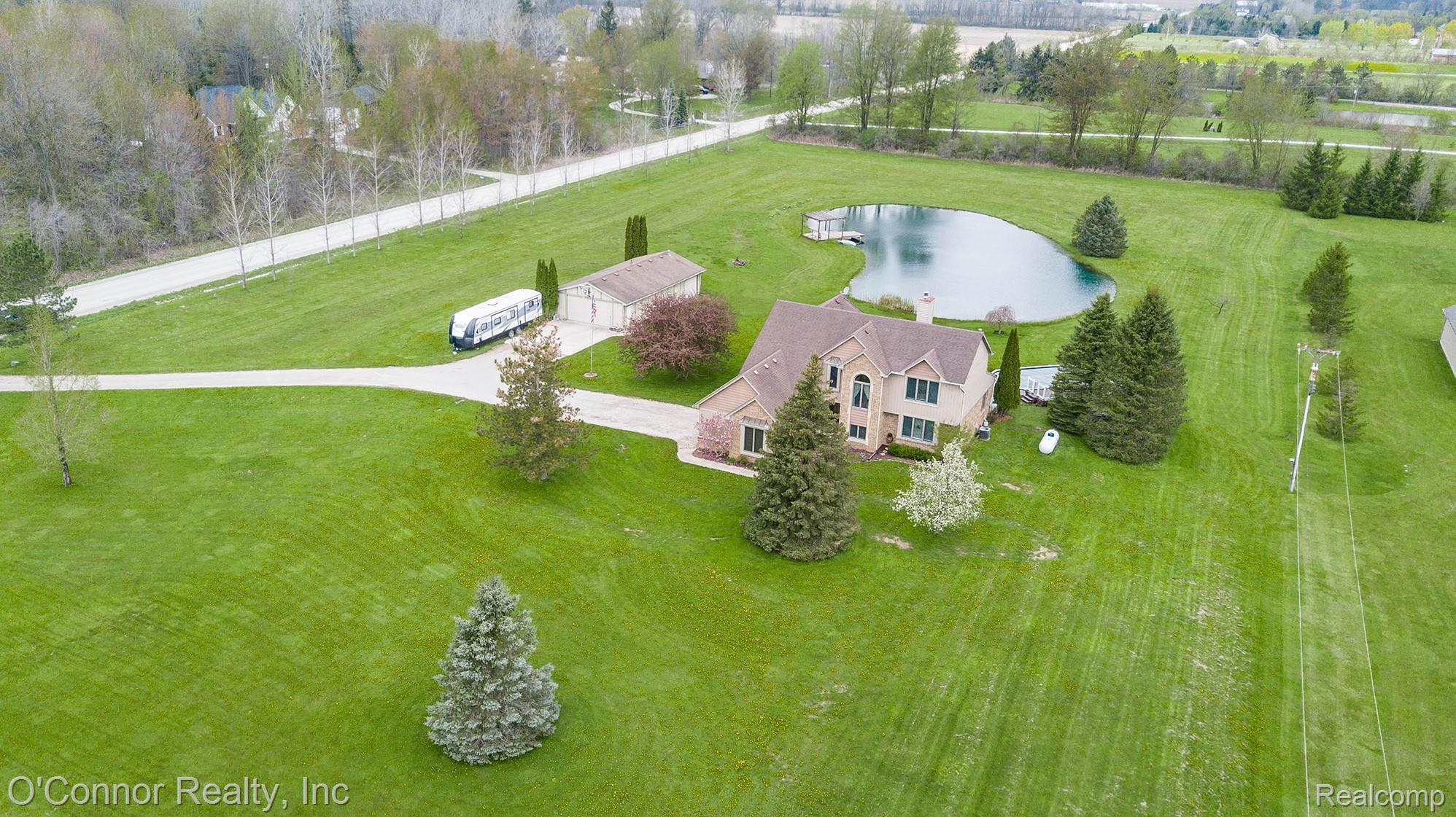 7978 Frith Road Columbus, MI 48063 - Photo 47 of 56 Aerial view of property and surrounding area featuring a nearby body of water