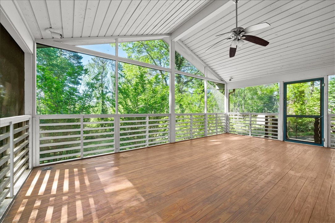 103 Satula Lane Clemson, SC 29631 - Photo 14 of 50 This airy screened porch offers serene views of the lush surrounding greenery, perfect for relaxed enjoyment.