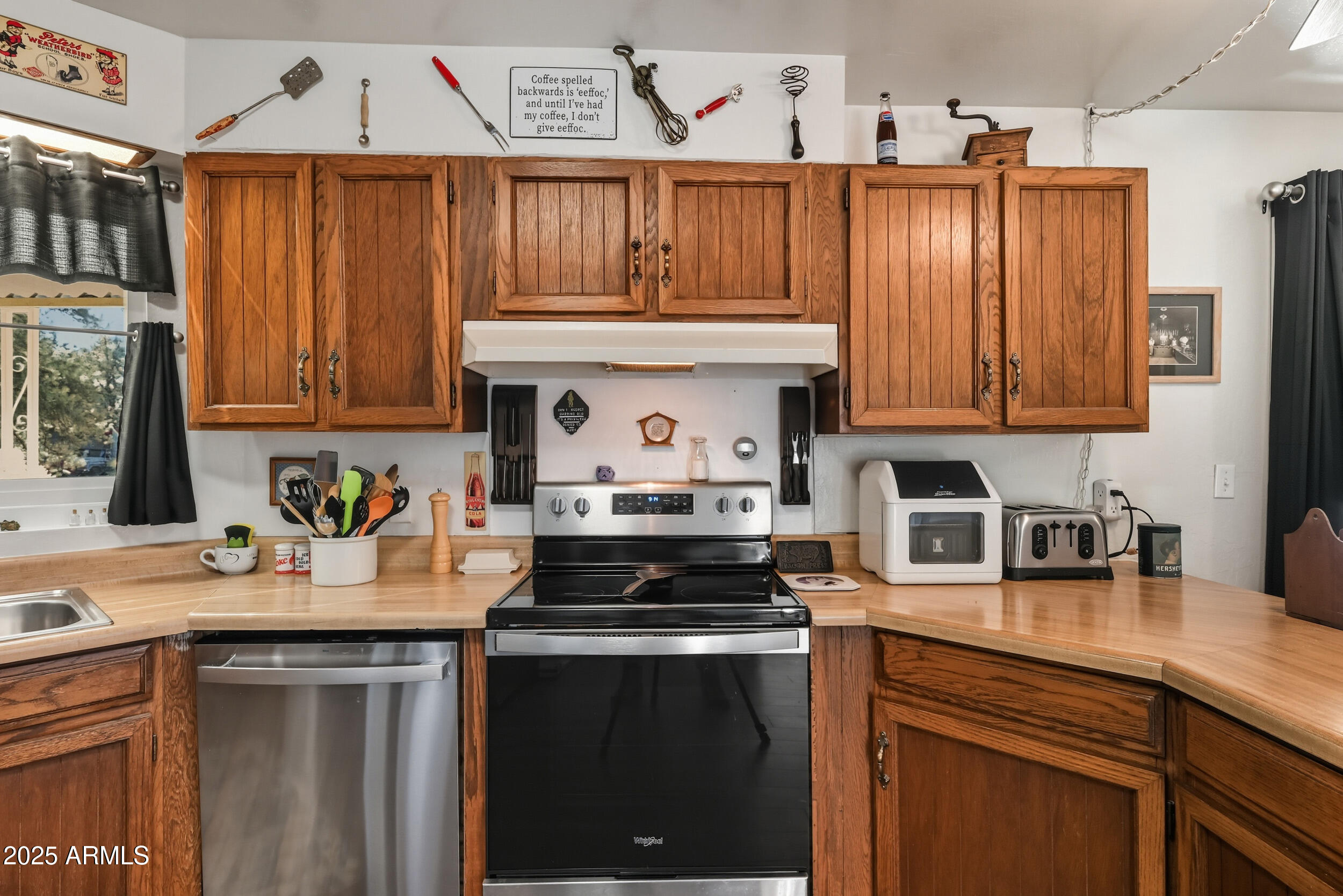 500 East Lorene Street Payson, AZ 85541 - Photo 15 of 41 a kitchen with granite countertop a stove a sink dishwasher and cabinets with wooden floor