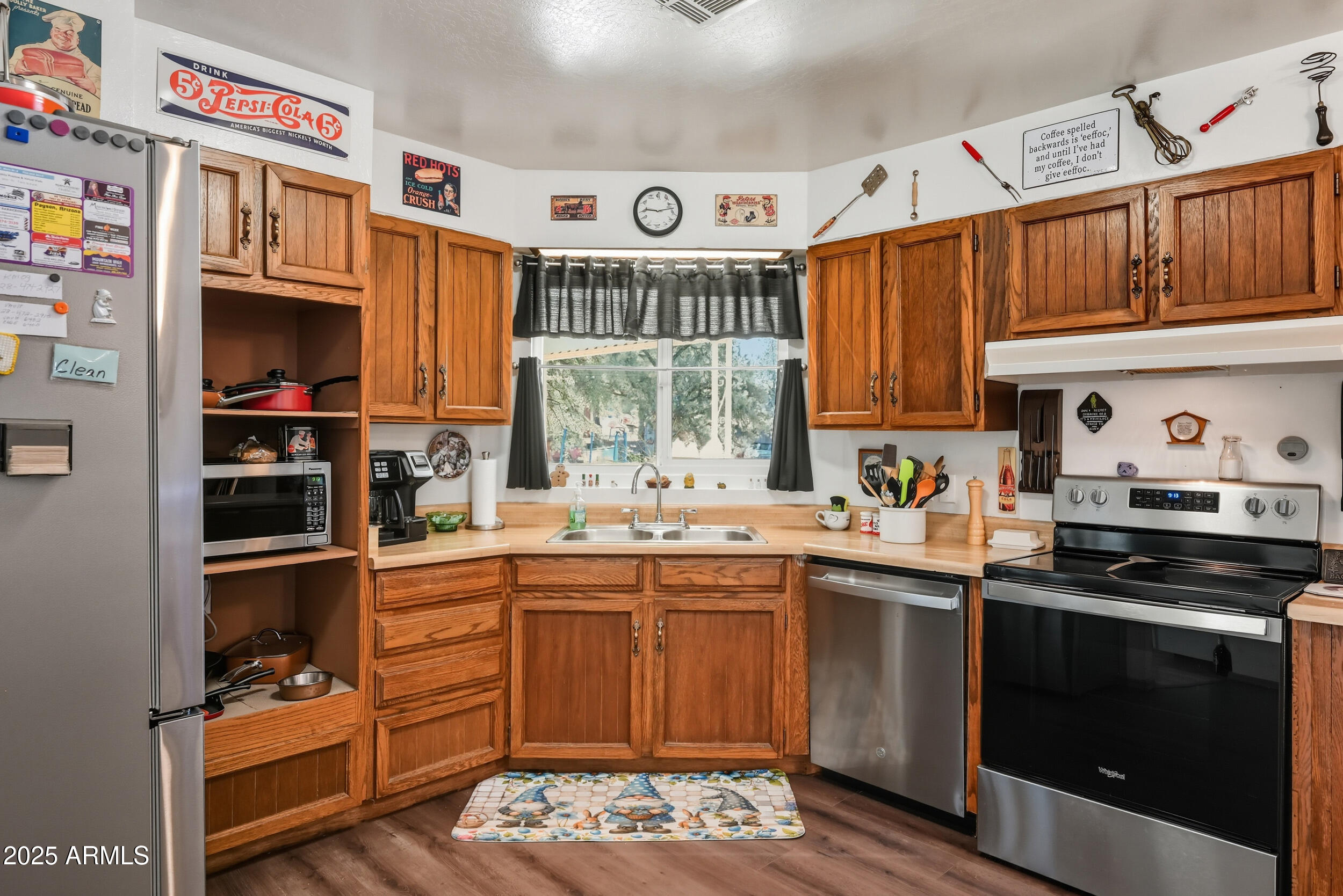 500 East Lorene Street Payson, AZ 85541 - Photo 16 of 41 a kitchen with stainless steel appliances a stove and a refrigerator