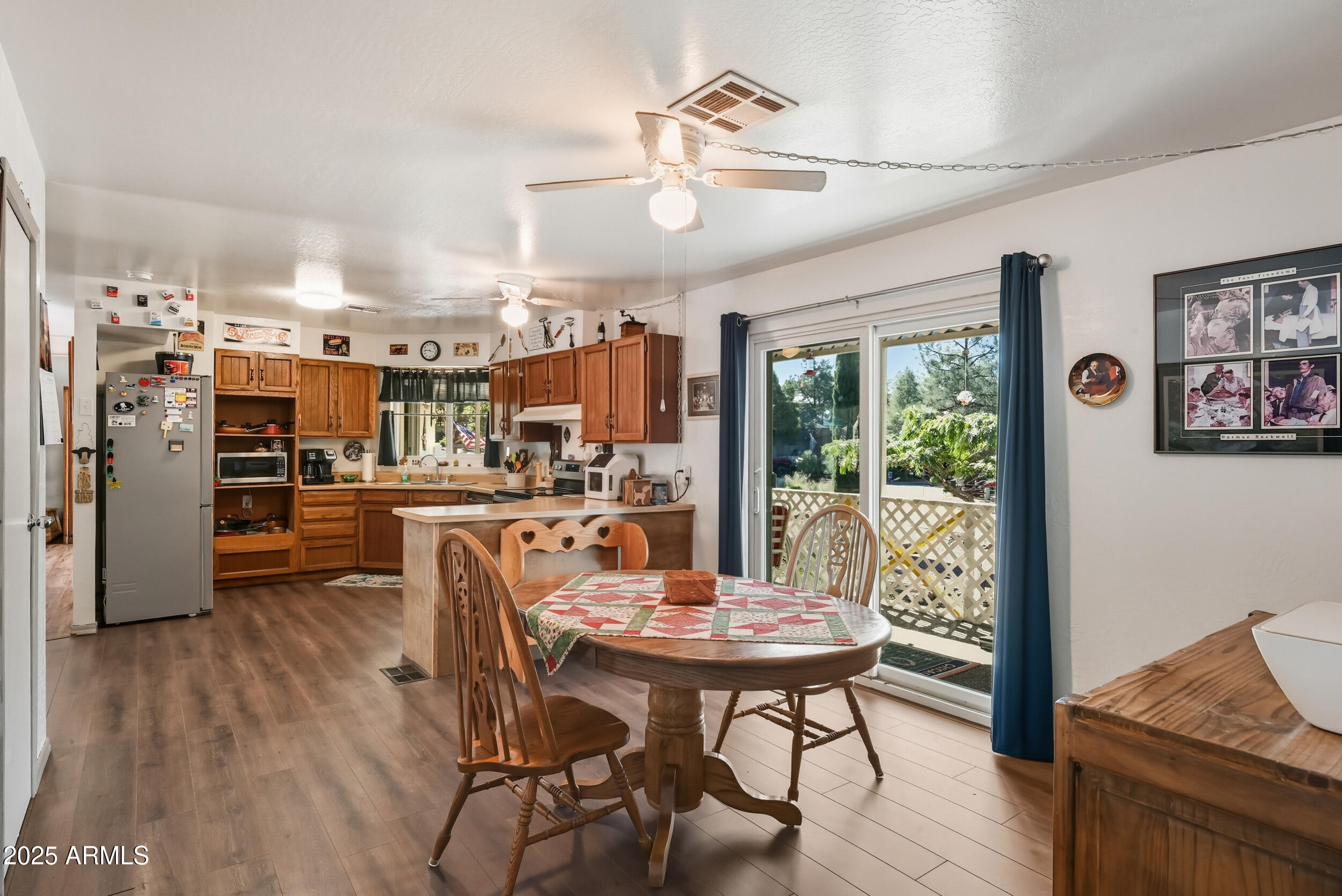 500 East Lorene Street Payson, AZ 85541 - Photo 19 of 41 a view of a dining room with furniture window and wooden floor