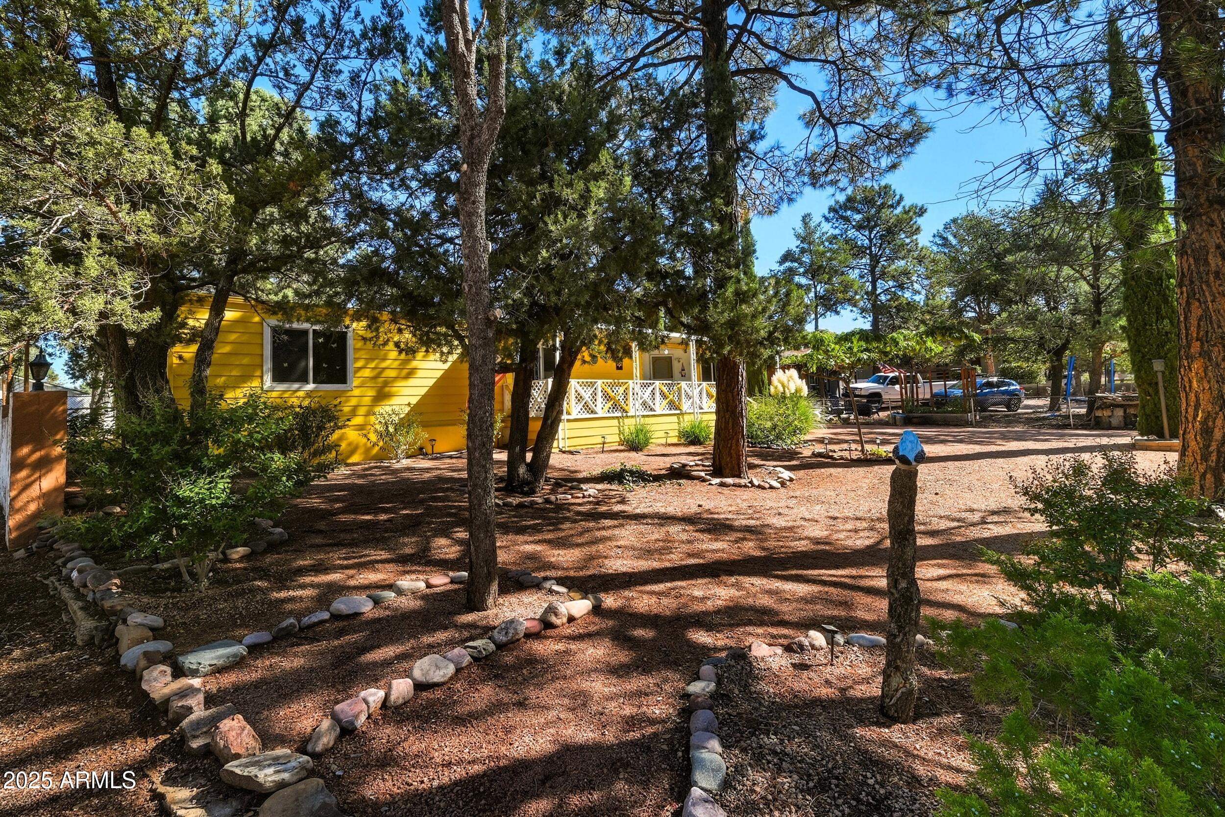 500 East Lorene Street Payson, AZ 85541 - Photo 2 of 41 a view of outdoor space with deck and tree