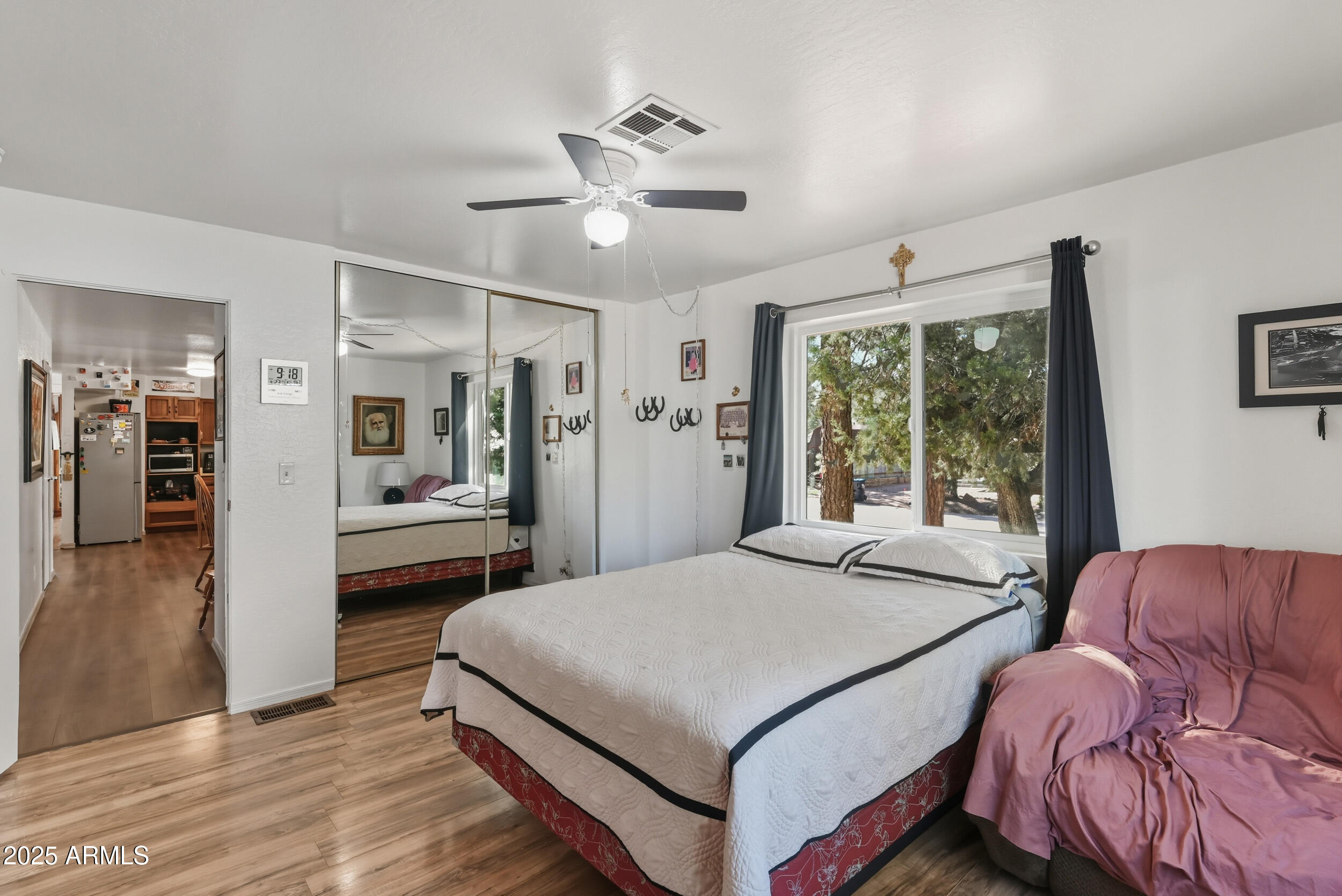 500 East Lorene Street Payson, AZ 85541 - Photo 21 of 41 a spacious bedroom with a bed and a dresser