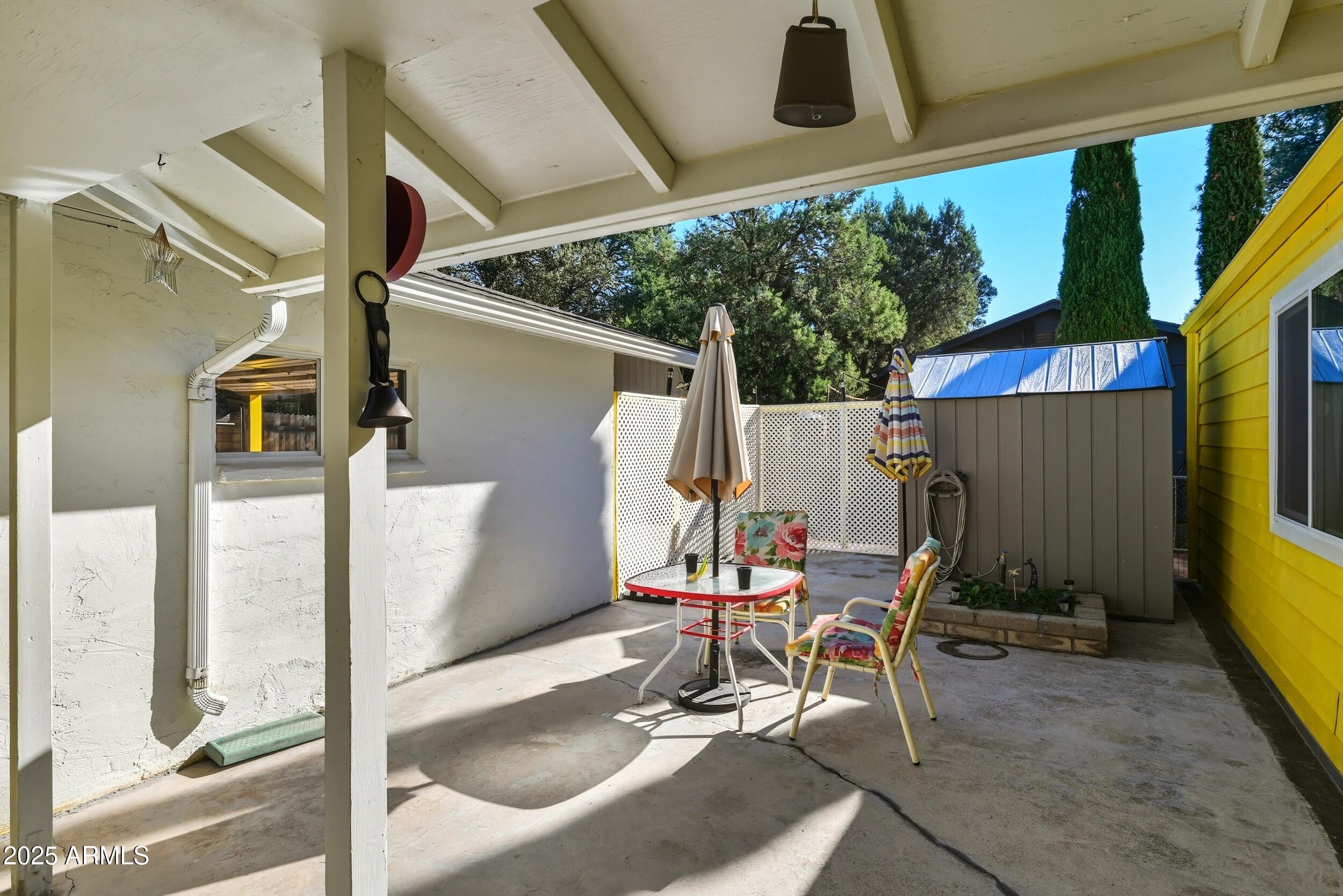 500 East Lorene Street Payson, AZ 85541 - Photo 34 of 41 a view of an outdoor sitting area with wooden walls