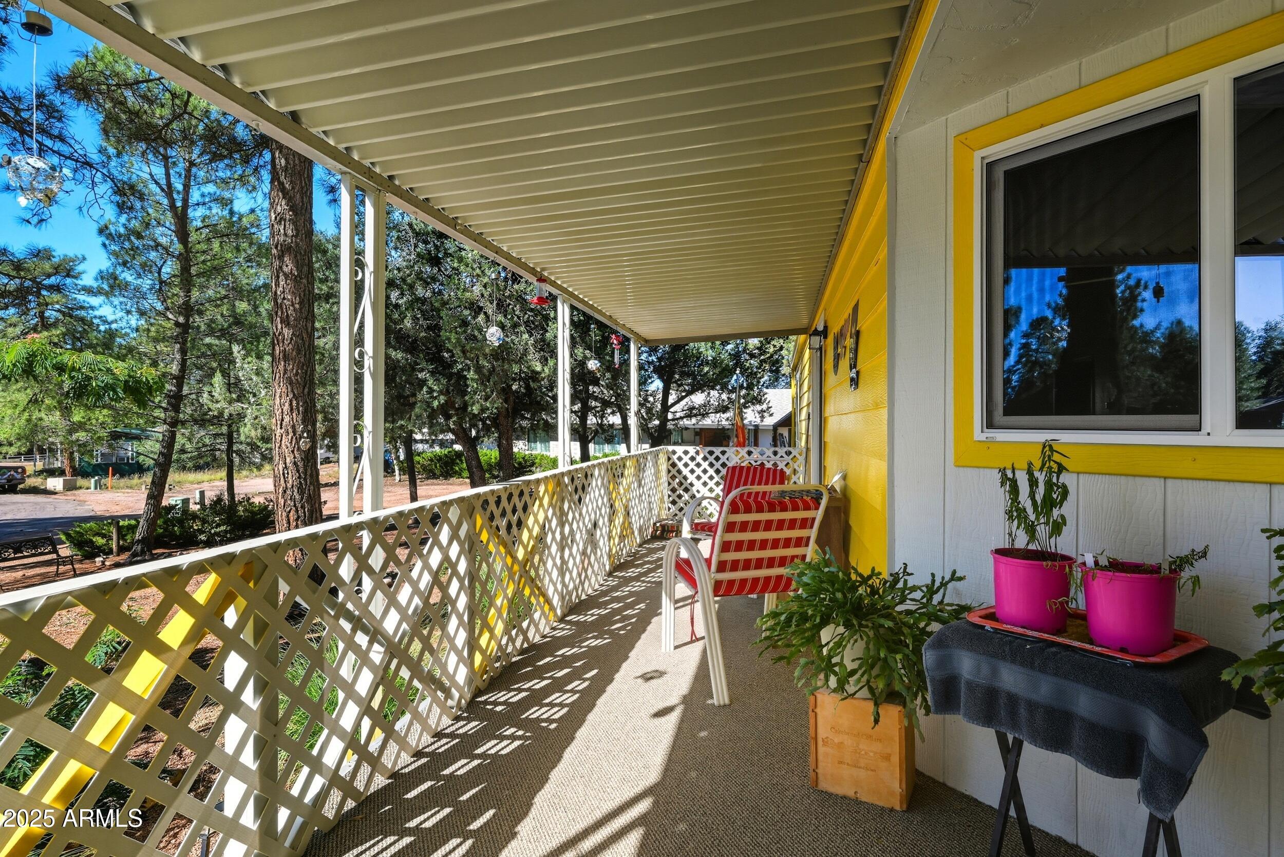 500 East Lorene Street Payson, AZ 85541 - Photo 6 of 41 a balcony with furniture and a potted plant