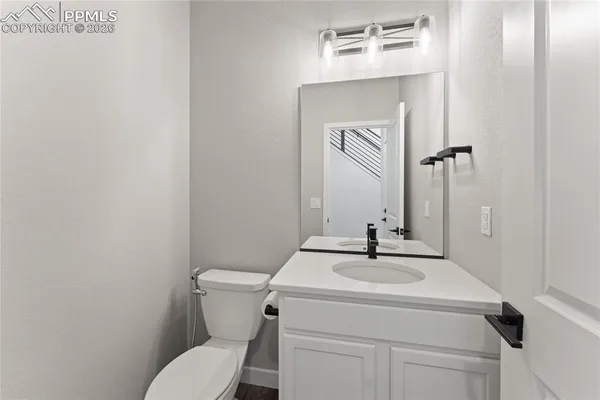 a bathroom with a shower and a toilet