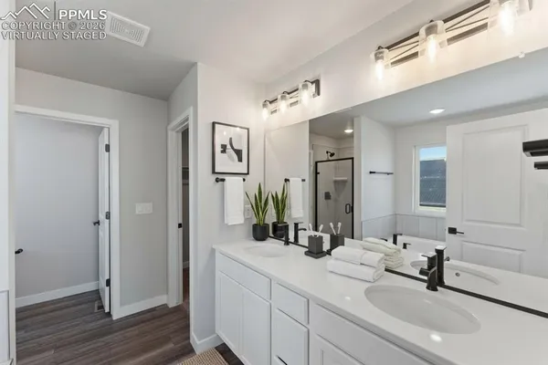 a view of room with window and hardwood floor