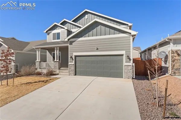 a front view of a house with a patio