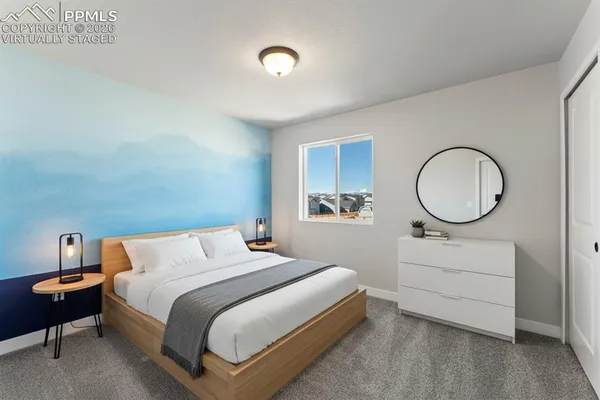 a view of a house with wooden fence