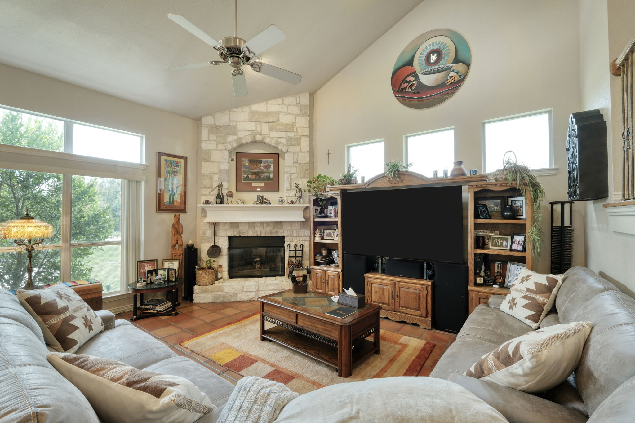1601 Coronado Leander, TX 78641 - Photo 10 of 37 a living room with furniture a fireplace and a large window