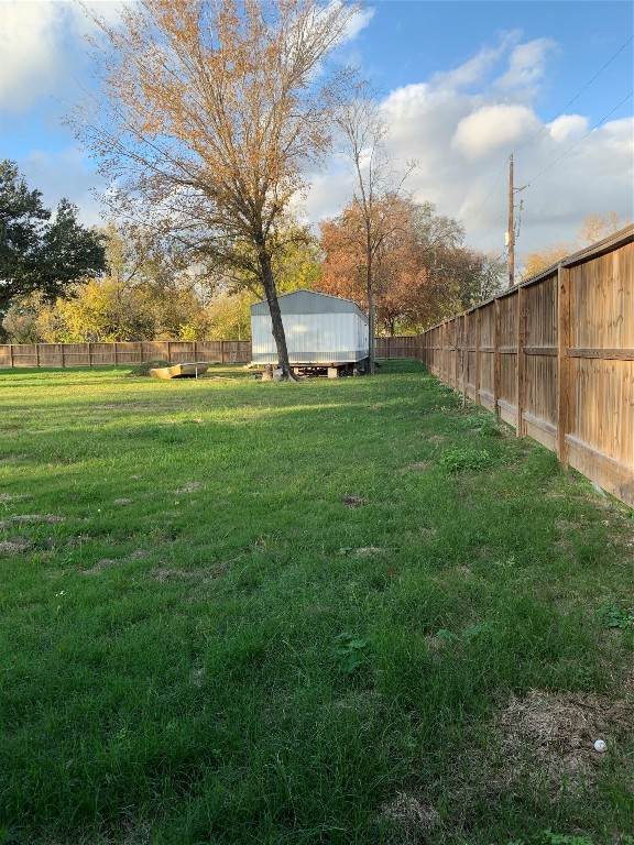 7702 Fairview Street Houston, TX 77041 - Photo 7 of 10 a backyard of a house with lots of green space