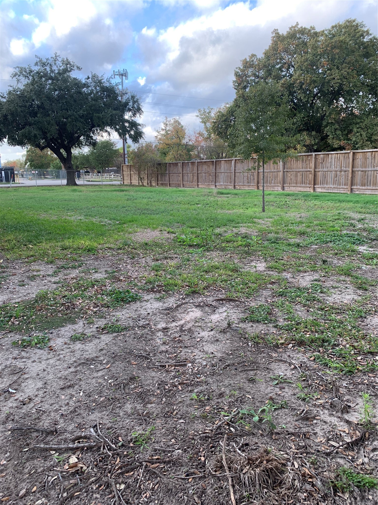 7702 Fairview Street Houston, TX 77041 - Photo 10 of 10 a view of a field with trees in the background