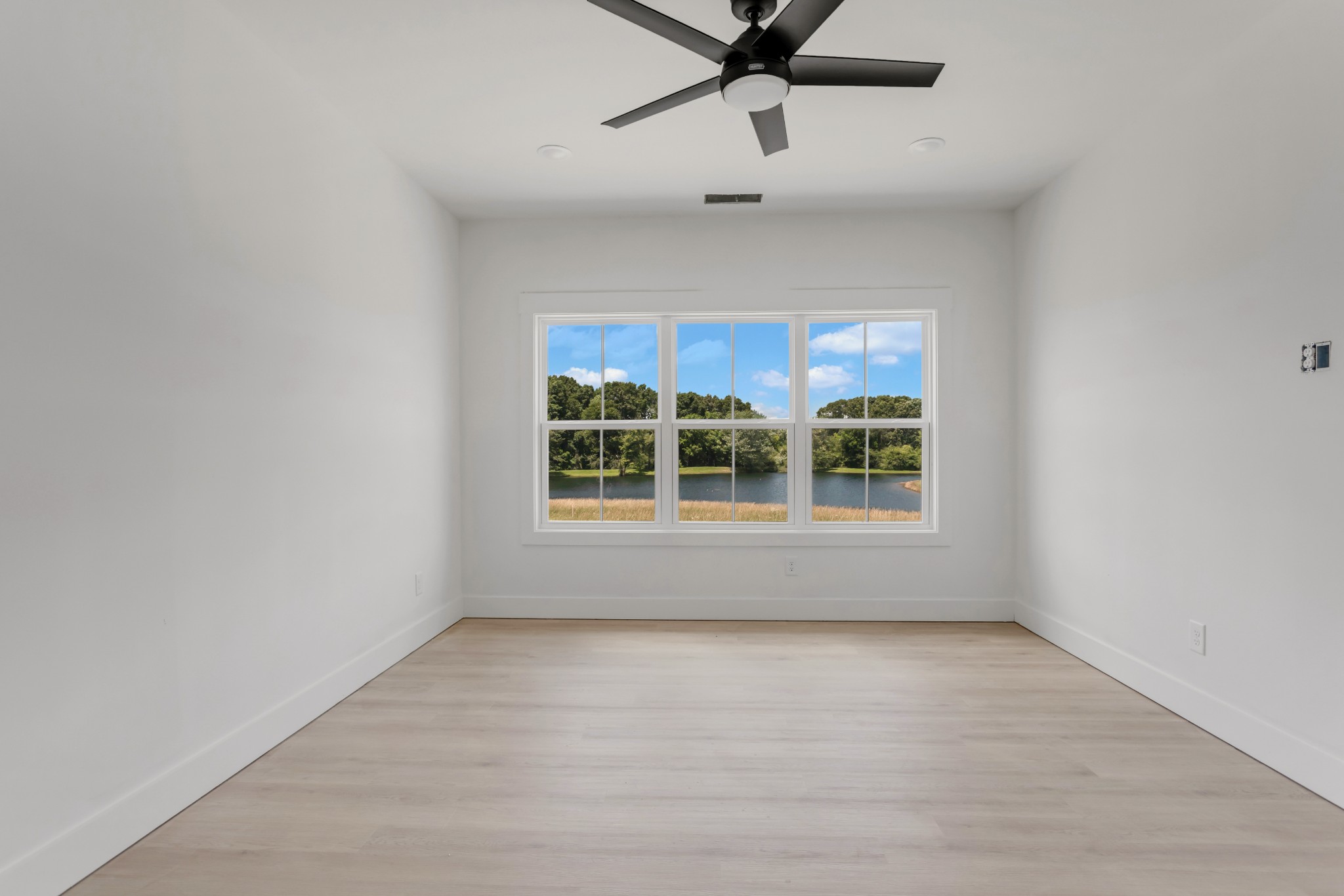 1171 Abiff Road Bon Aqua, TN 37025 - Photo 18 of 45 a view of an empty room with a window