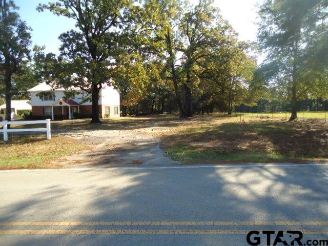16994-c R 223 C R 223 Arp, TX 75750 - Photo 2 of 38 a view of a yard with plants and trees