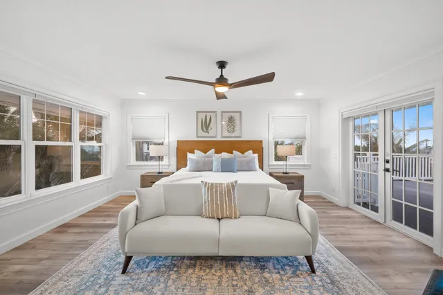 a view of a patio with table and chairs