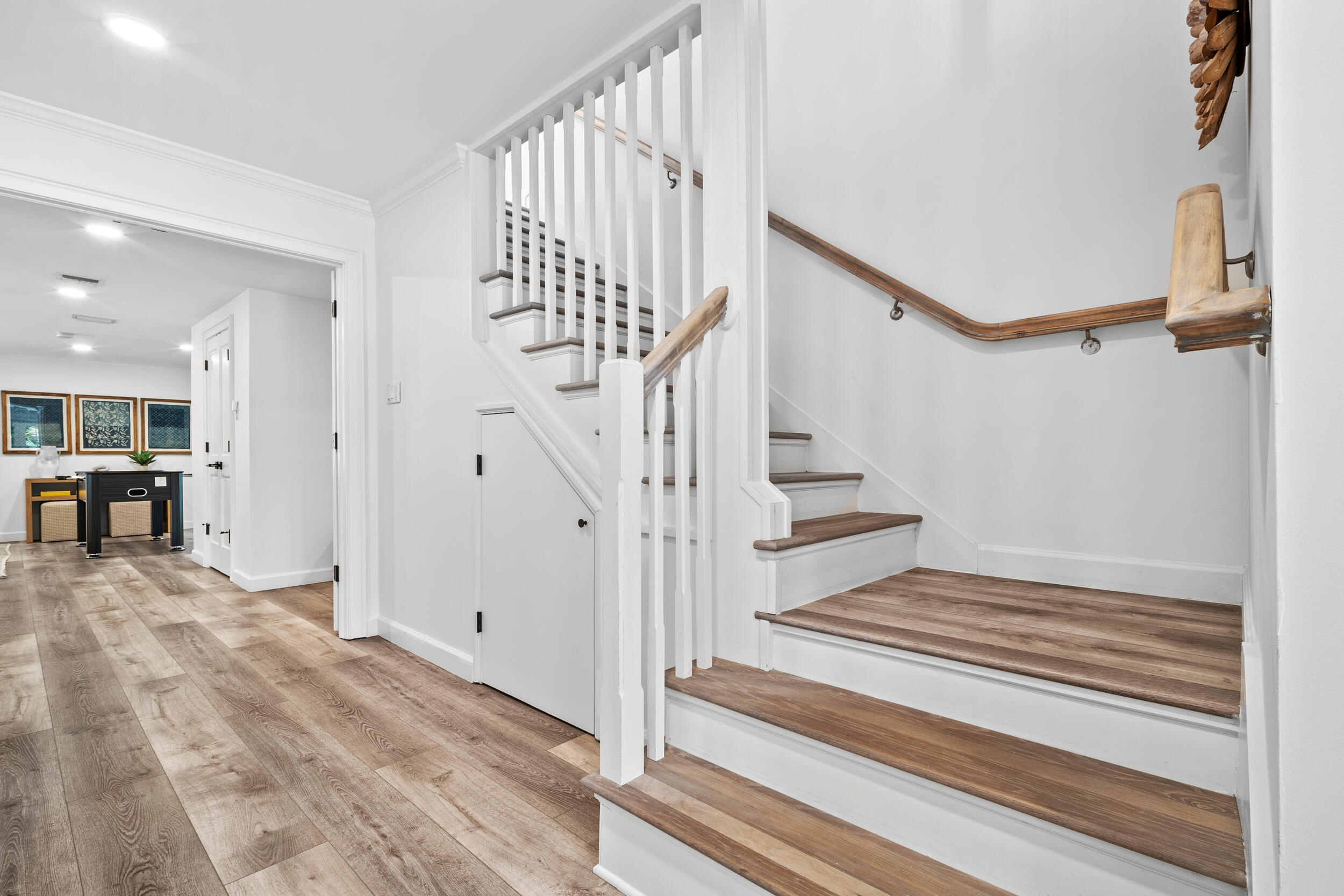 12376 Florida A1A Vero Beach, FL 32963 - Photo 26 of 92 a view of entryway and hall with wooden floor