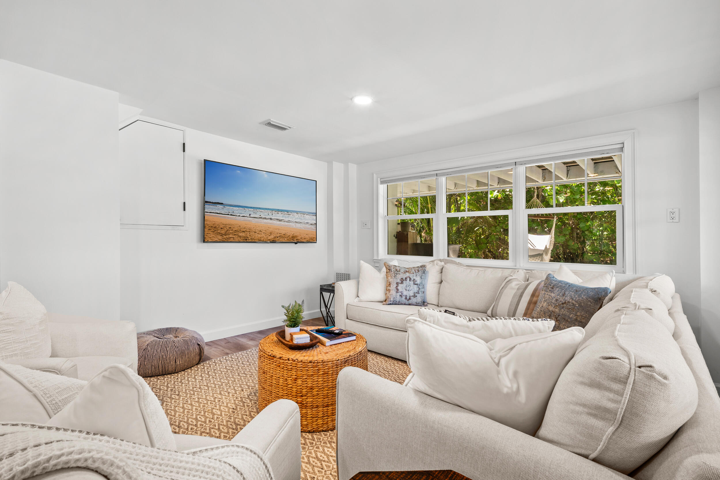 12376 Florida A1A Vero Beach, FL 32963 - Photo 36 of 92 a living room with furniture and a large window