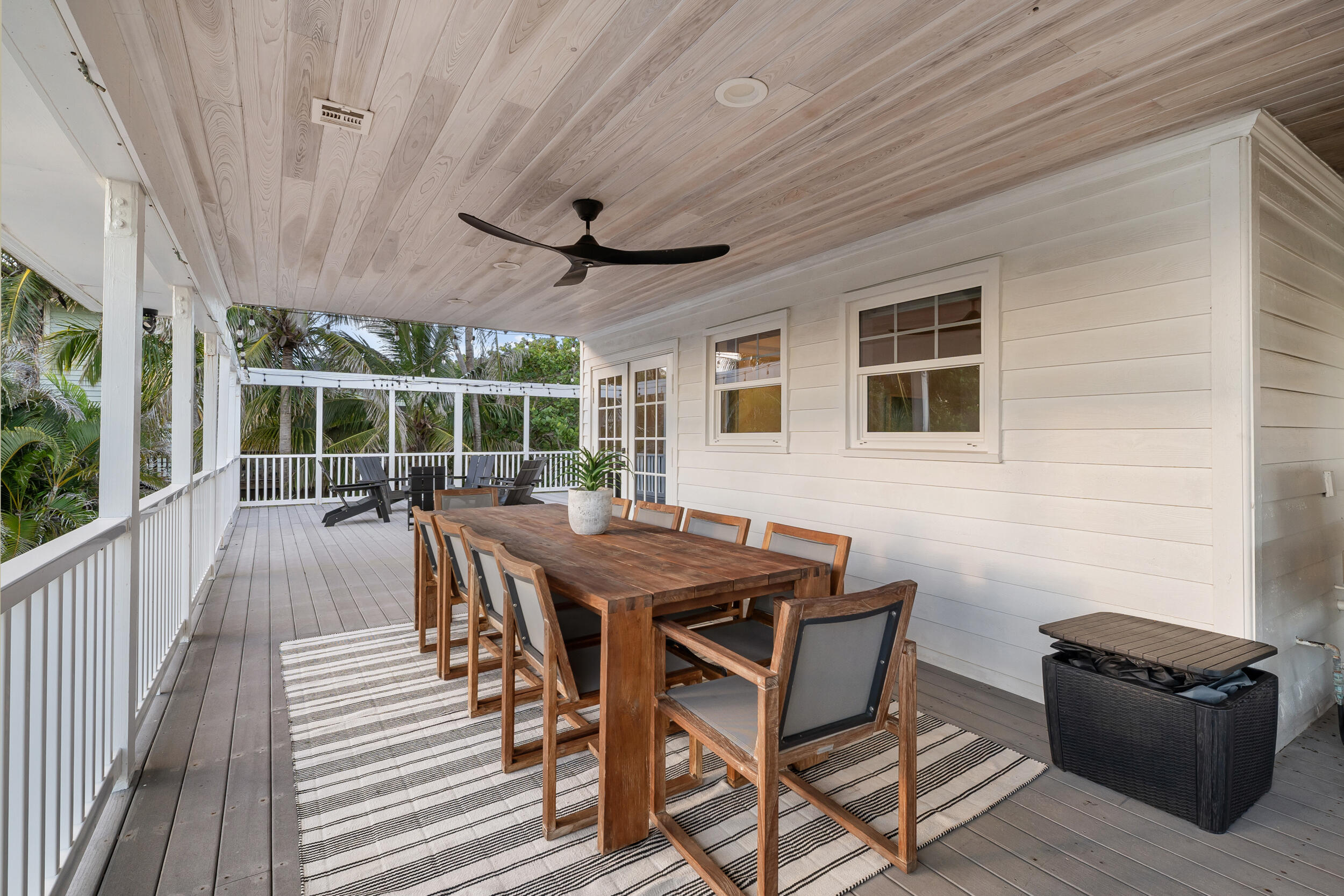 12376 Florida A1A Vero Beach, FL 32963 - Photo 66 of 92 a view of a patio with table and chairs