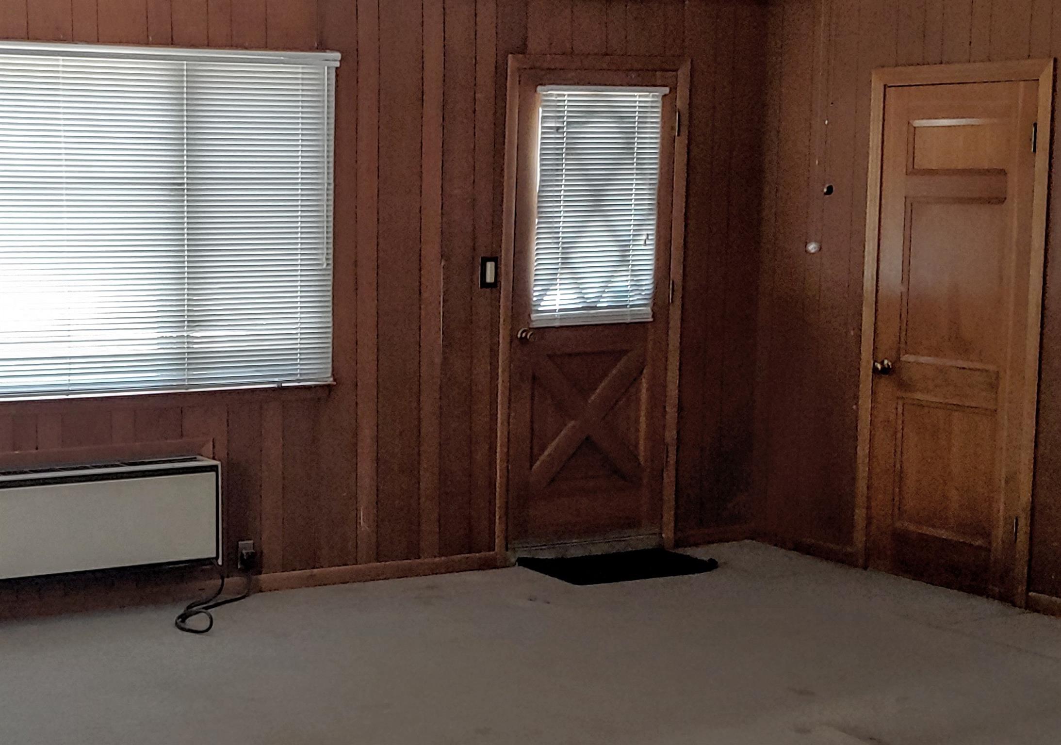 718 North Rutherford Boulevard Murfreesboro, TN 37130 - Photo 24 of 30 Downstairs playroom with outside entrance to driveway.