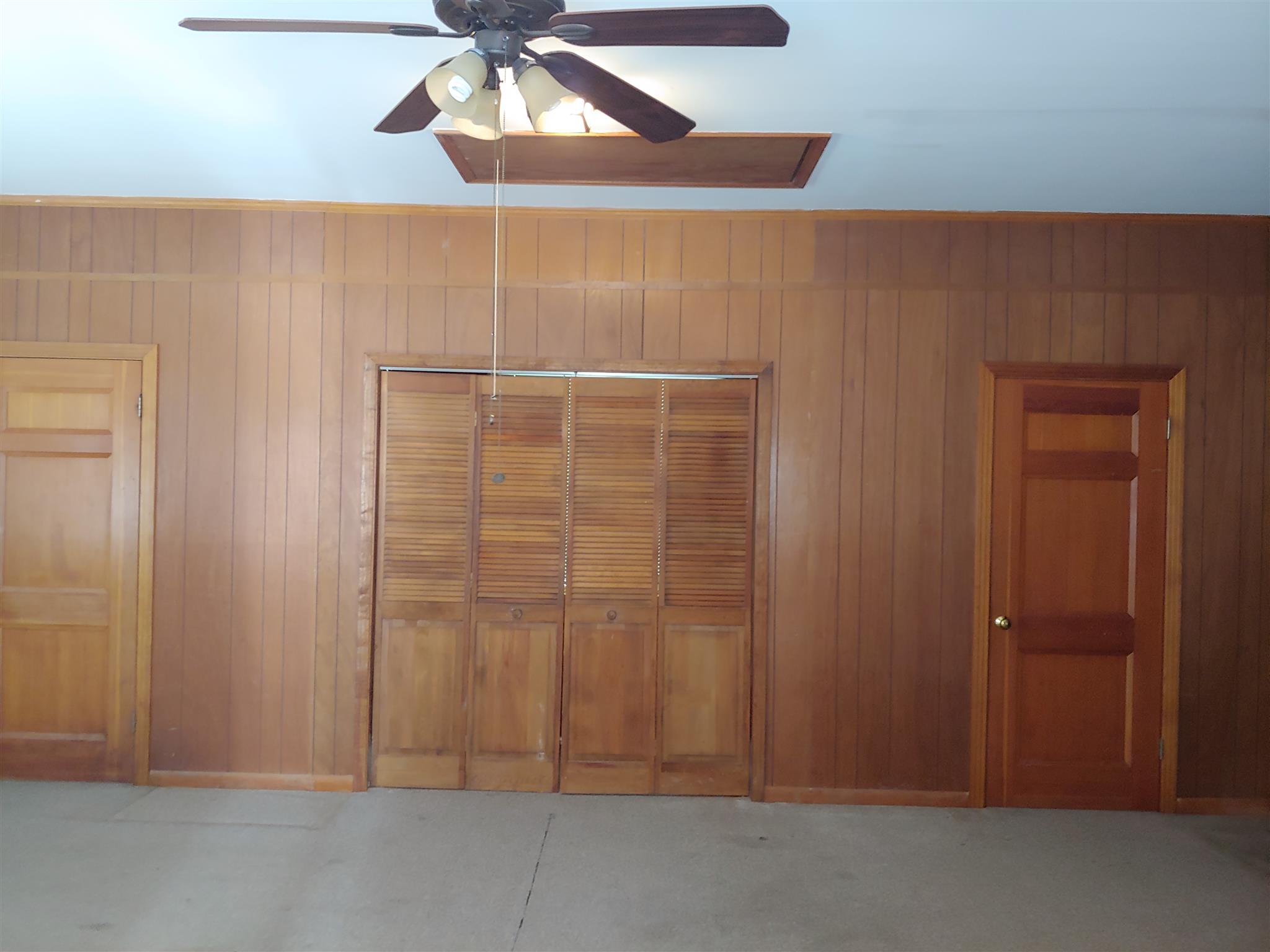 718 North Rutherford Boulevard Murfreesboro, TN 37130 - Photo 26 of 30 Lots of closet space in the playroom. Middle closet has space for workbench and window.