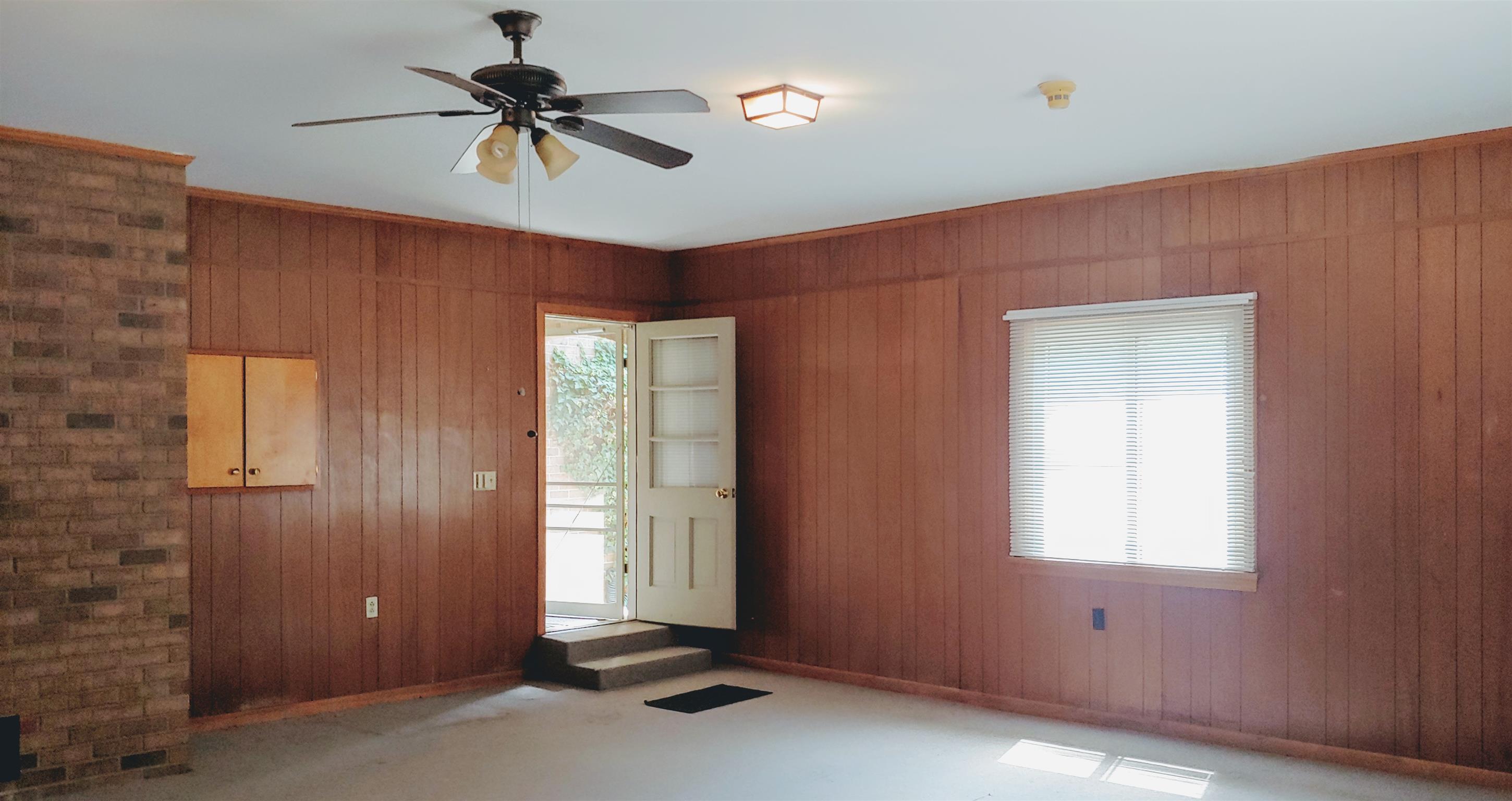 718 North Rutherford Boulevard Murfreesboro, TN 37130 - Photo 27 of 30 Exit from playroom to courtyard and home entrance.