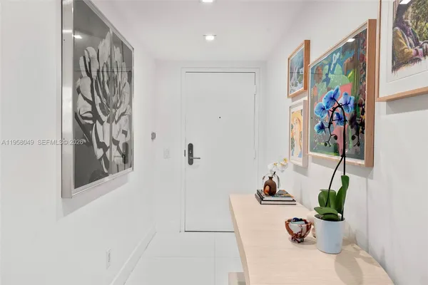 a room with gym equipment and a large window