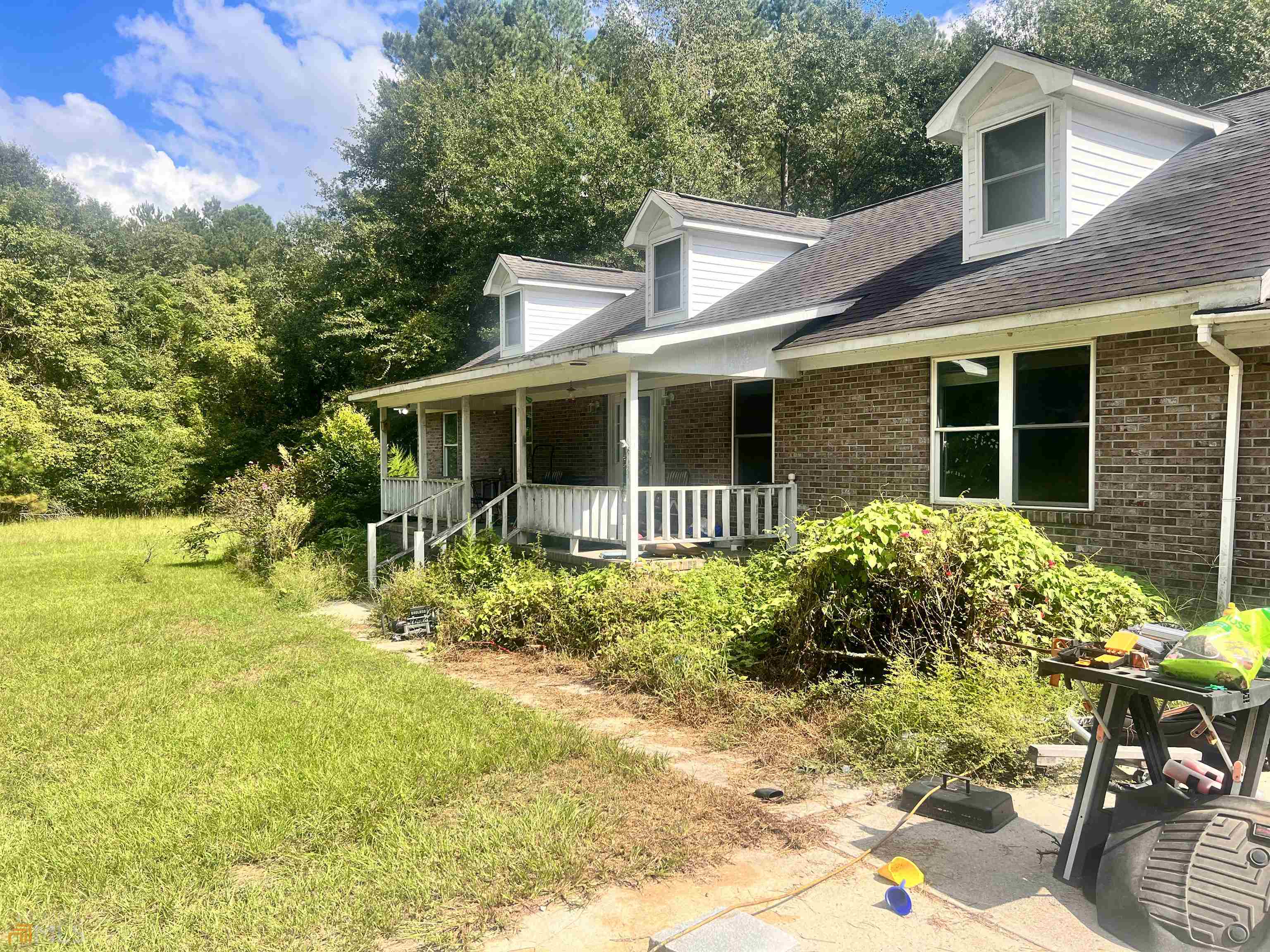 1382 Stills Road Metter, GA 30439 - Photo 1 of 1 a view of a house with backyard and sitting area