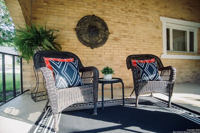 a view of a chairs with table in balcony