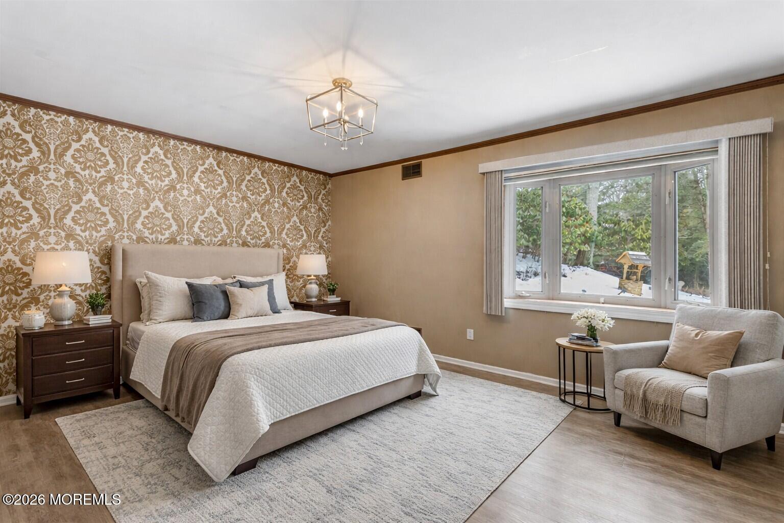 323 Arlene Terrace Aberdeen, NJ 07747 - Photo 15 of 28 a bedroom with a large bed and a couch