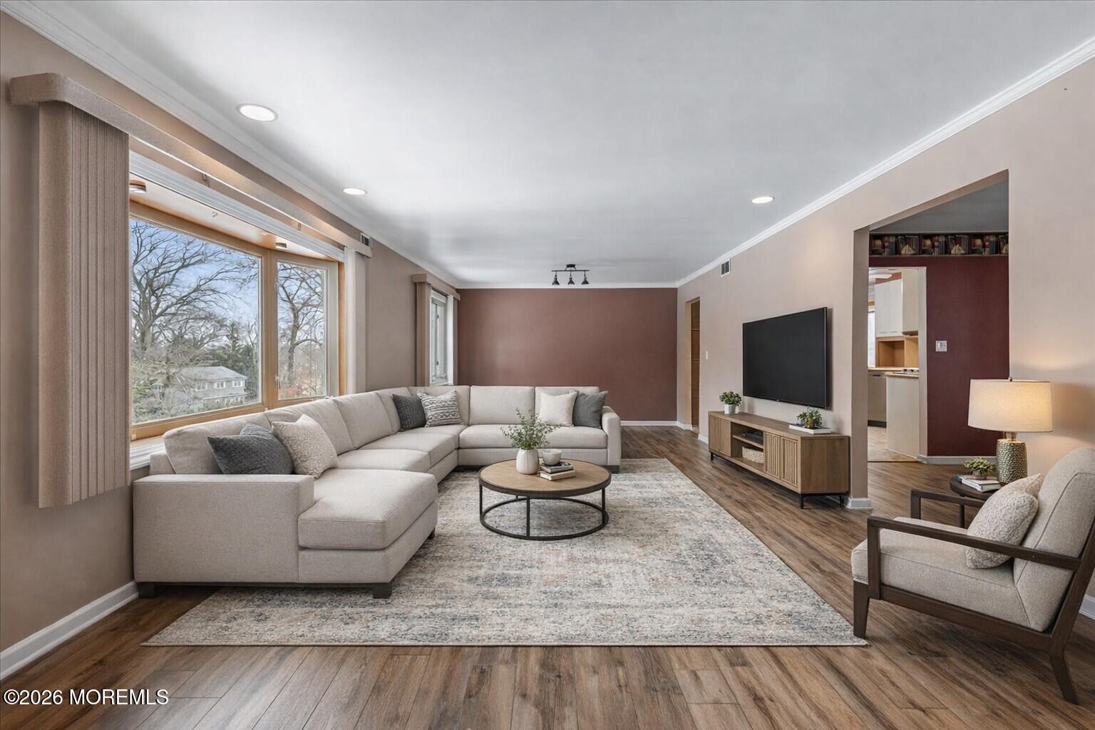 323 Arlene Terrace Aberdeen, NJ 07747 - Photo 6 of 28 a living room with furniture and a flat screen tv