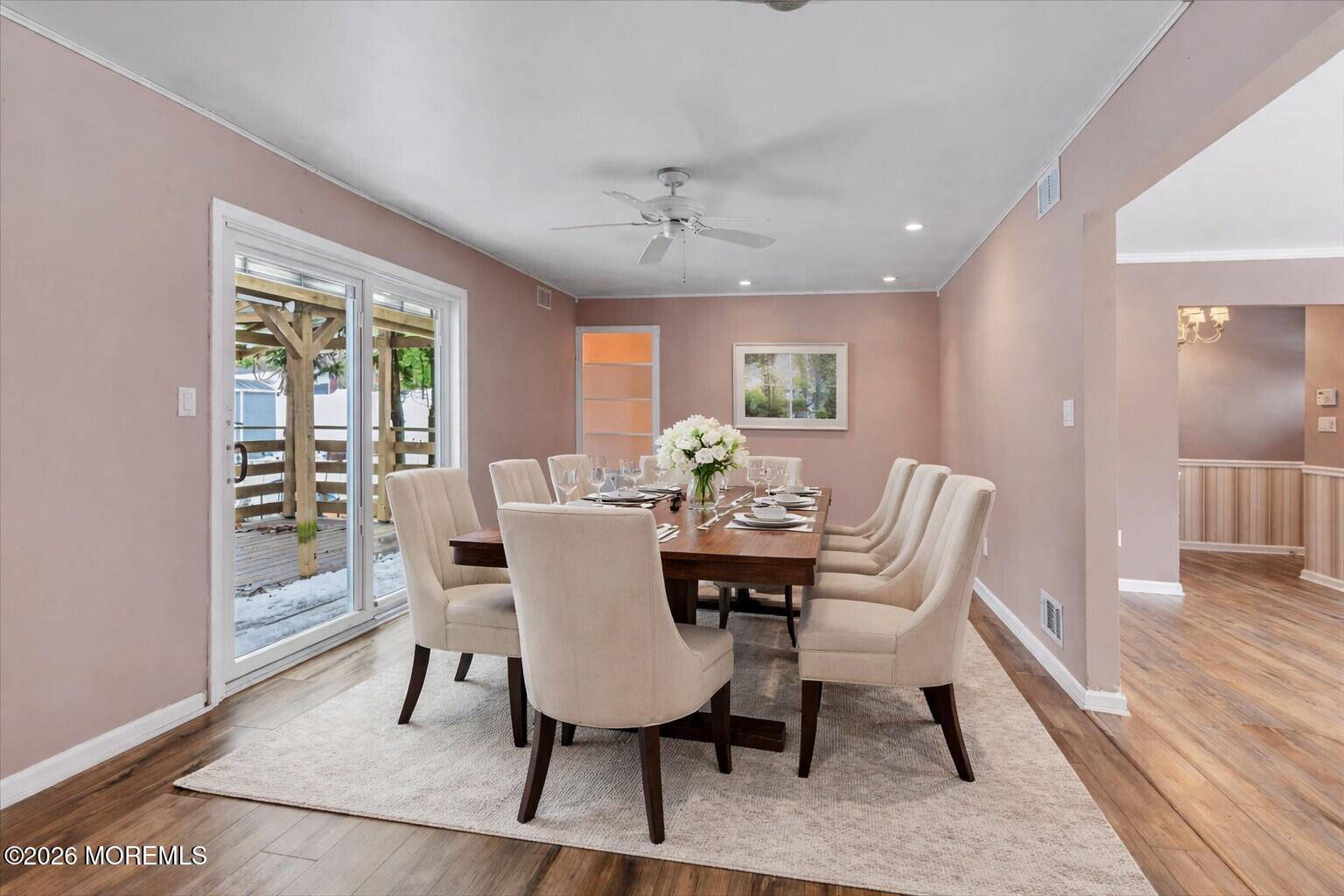 323 Arlene Terrace Aberdeen, NJ 07747 - Photo 10 of 28 a view of a dining room with furniture window and wooden floor