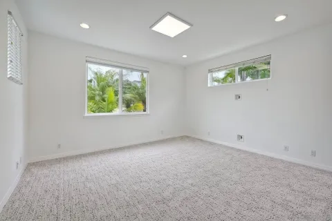 an empty room with windows