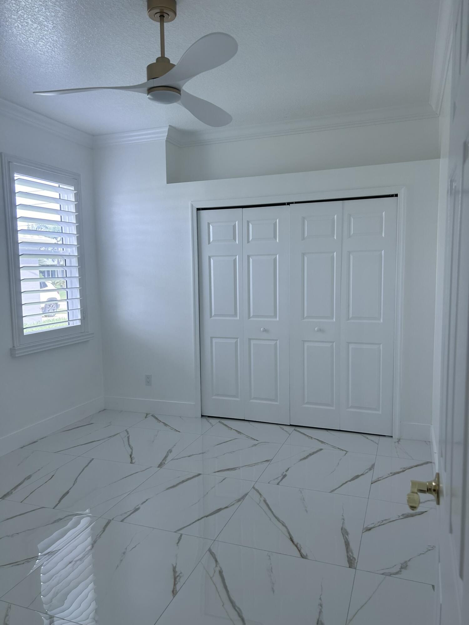 3158 Southwest Martin Street Port St. Lucie, FL 34953 - Photo 12 of 26 an empty room with windows