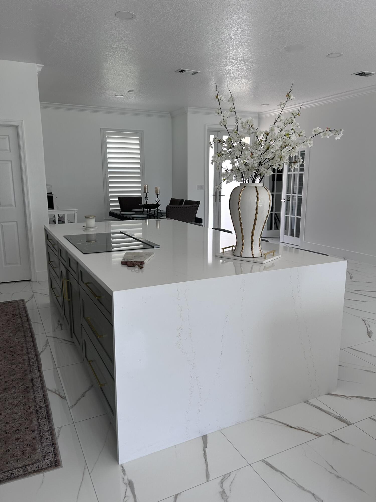 3158 Southwest Martin Street Port St. Lucie, FL 34953 - Photo 15 of 26 a kitchen with a sink and chandelier