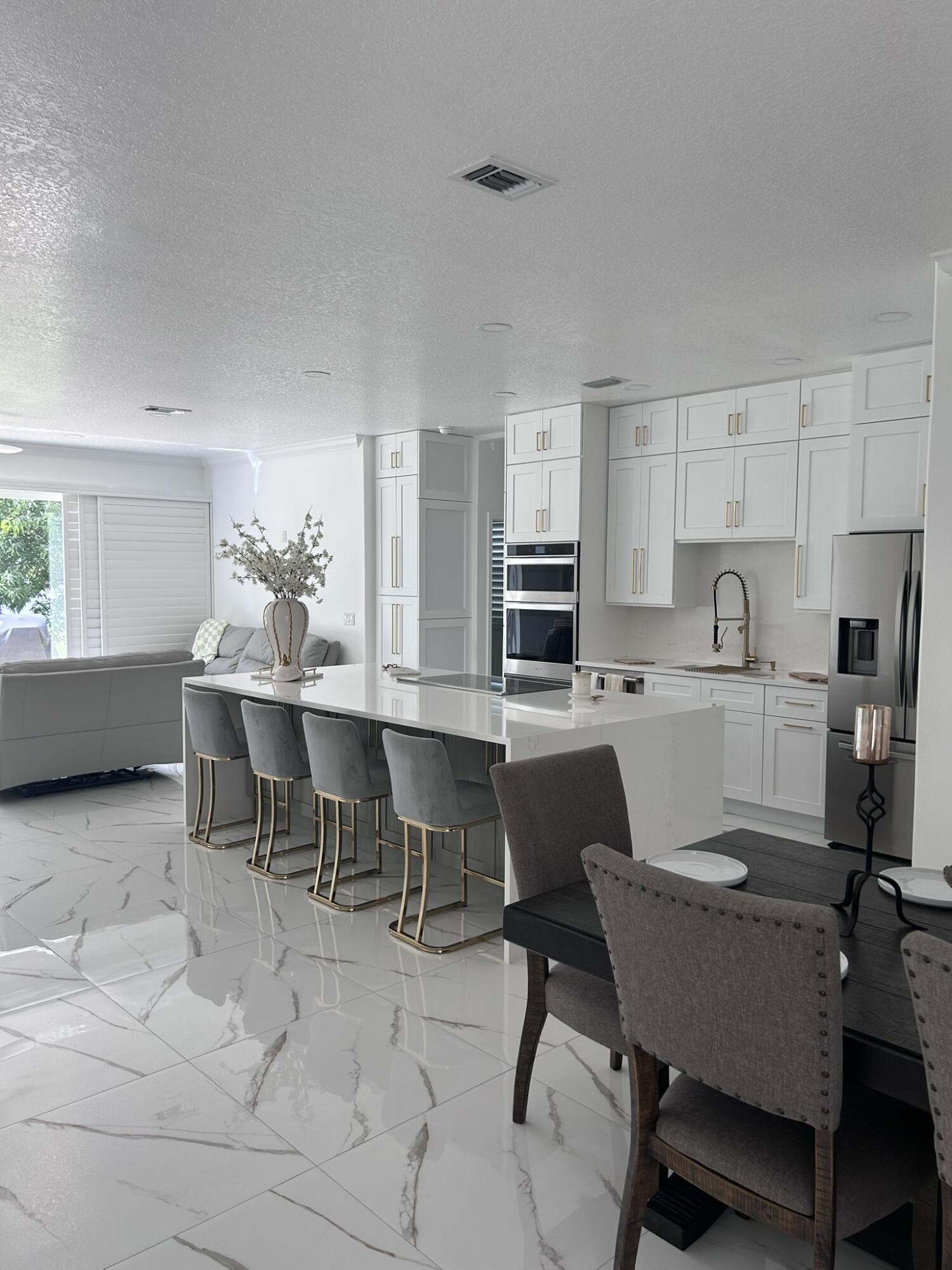 3158 Southwest Martin Street Port St. Lucie, FL 34953 - Photo 23 of 26 a dining room with furniture and window