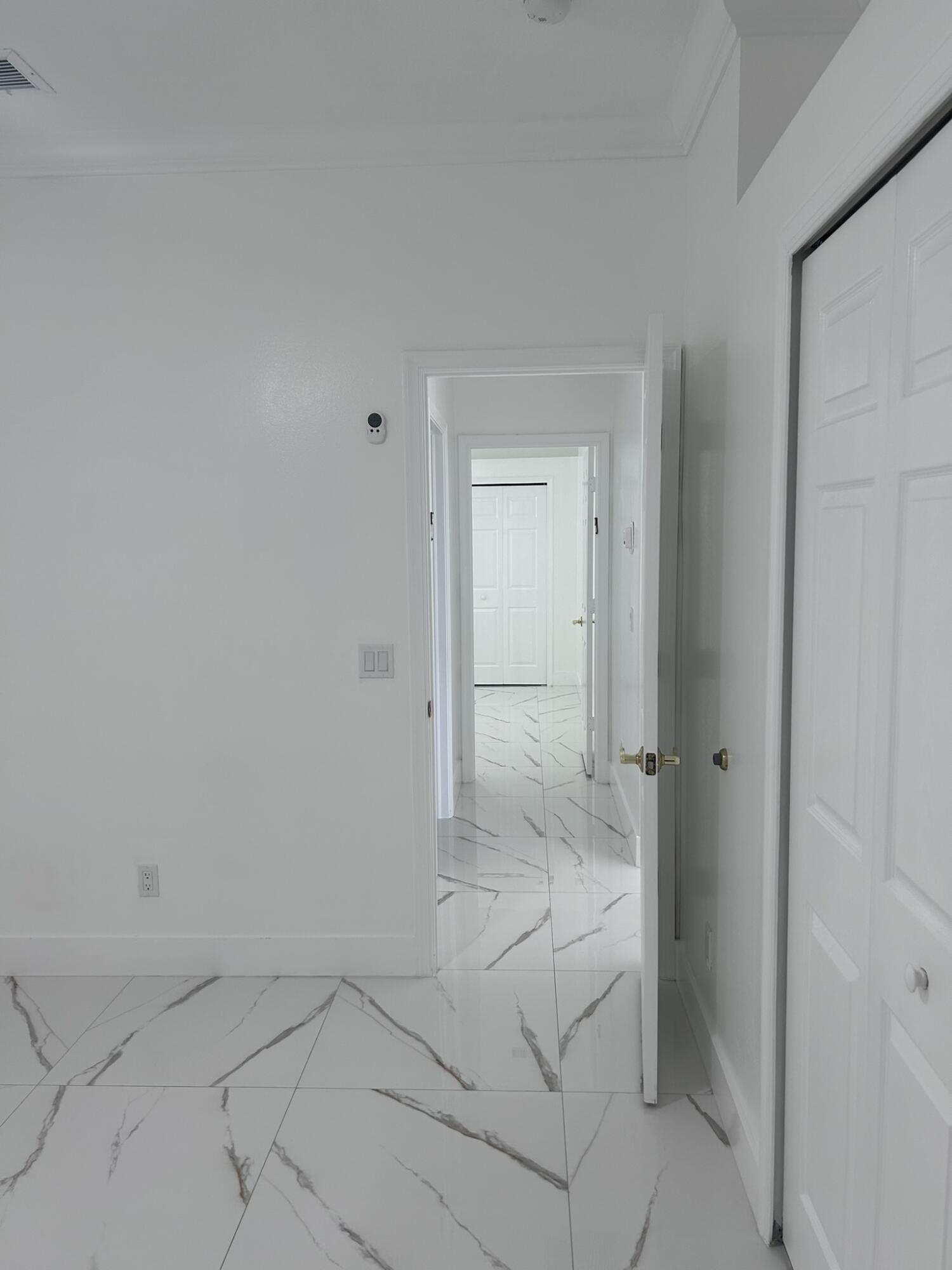 3158 Southwest Martin Street Port St. Lucie, FL 34953 - Photo 10 of 26 a spacious bathroom with a granite countertop toilet and a shower
