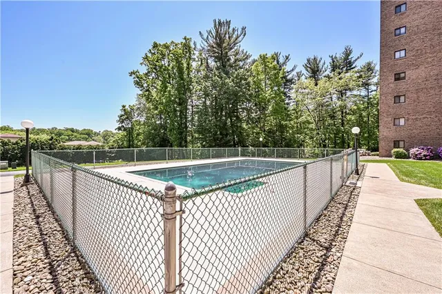 a view of a backyard with sitting area