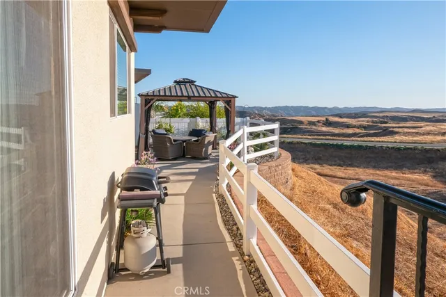 an aerial view of a house with a swimming pool