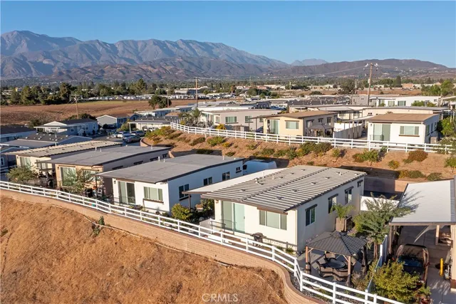 an aerial view of residential houses and city view