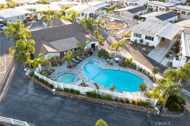 a view of roof with wooden floor and fence