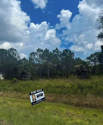 a garden view with a lake view