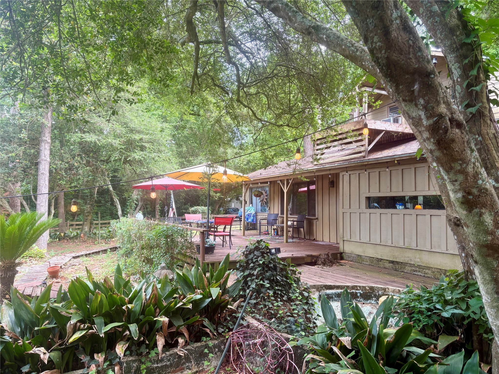 12505 Rollingwood Loop Conroe, TX 77303 - Photo 3 of 24 an outdoor space view with sitting space