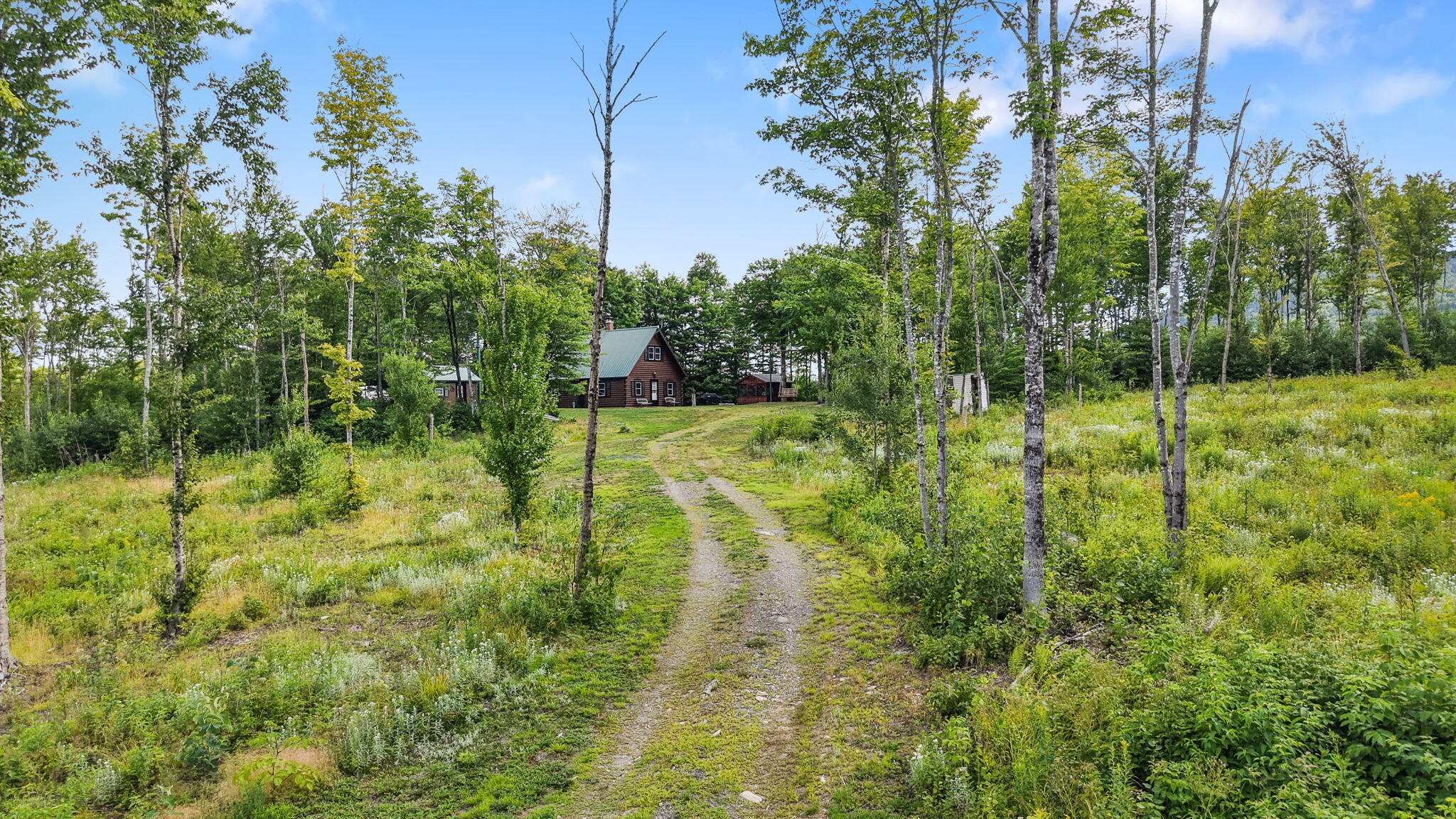 130 Schoolbus Rd Mount Mount Chase, ME 04765 - Photo 3 of 63 1-web-or-mls-dji_fly_20260801_103824_086